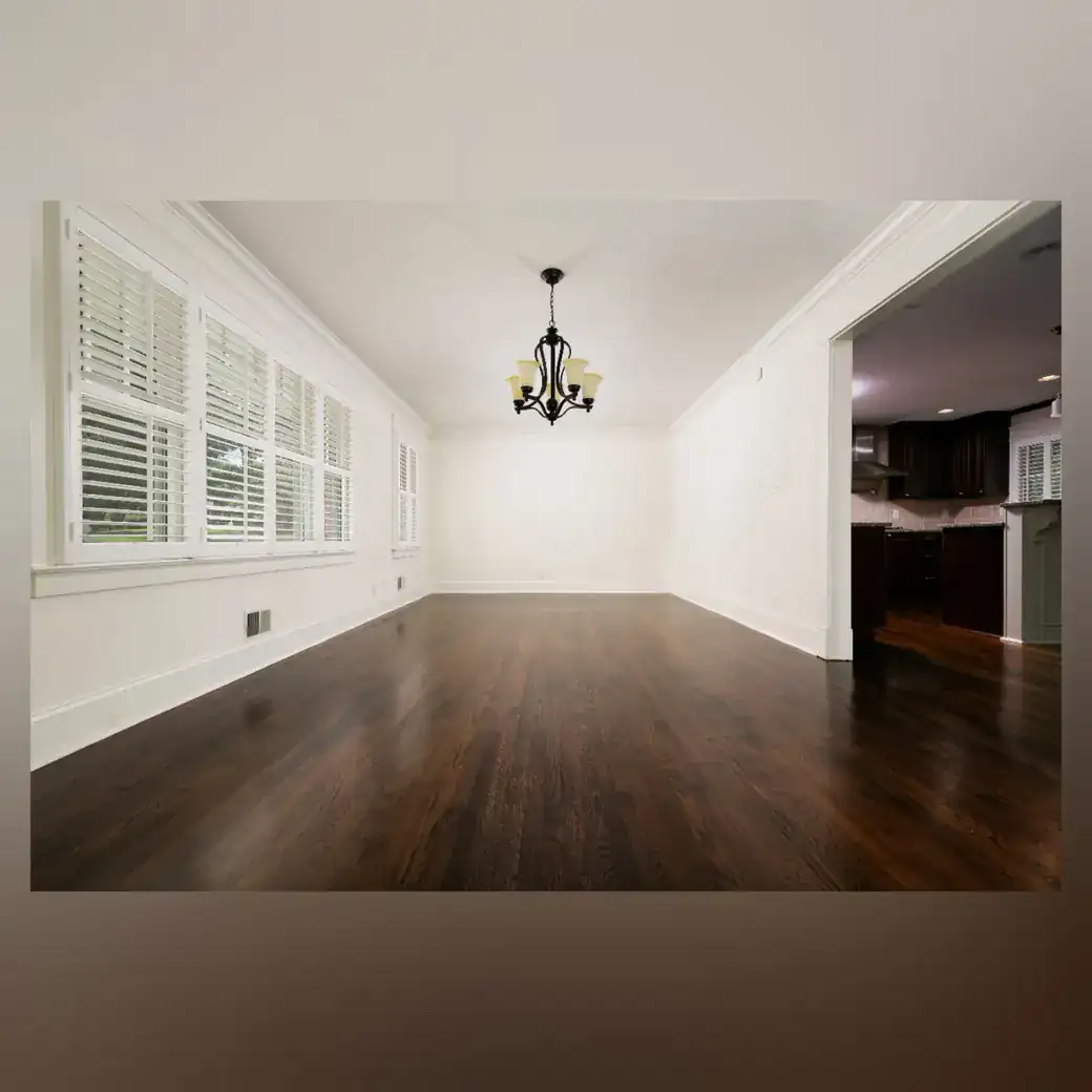 Hardwood Floor Refinishing Project | Final Floors LLC Finished dark hardwood flooring in a bright Metro Atlanta dining and living area
