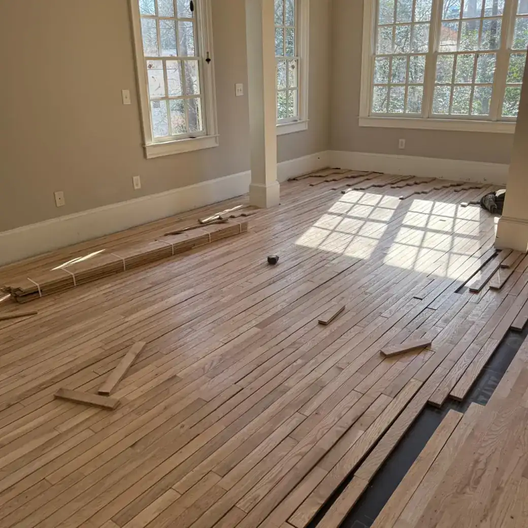 Custom Hardwood and Herringbone Installation | Final Floors LLC Hardwood flooring layout and installation in progress on a Metro Atlanta custom flooring project