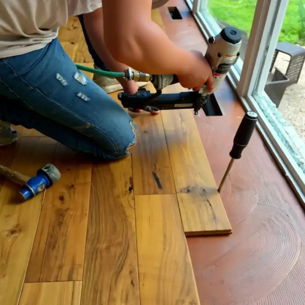 Hardwood Flooring Installation | Final Floors LLC Hardwood flooring installation in progress with a pneumatic floor nailer in a Metro Atlanta home