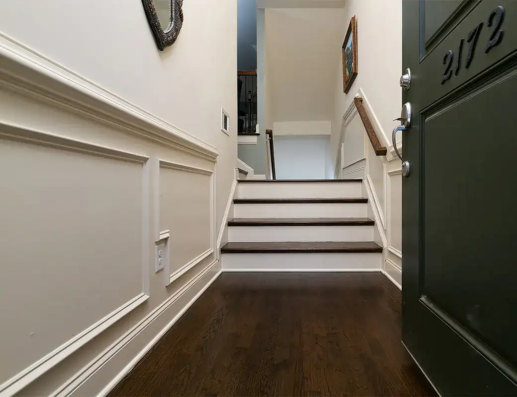 Staircase Repair and Remodeling | Final Floors LLC Finished hardwood foyer steps and staircase details in a Metro Atlanta home